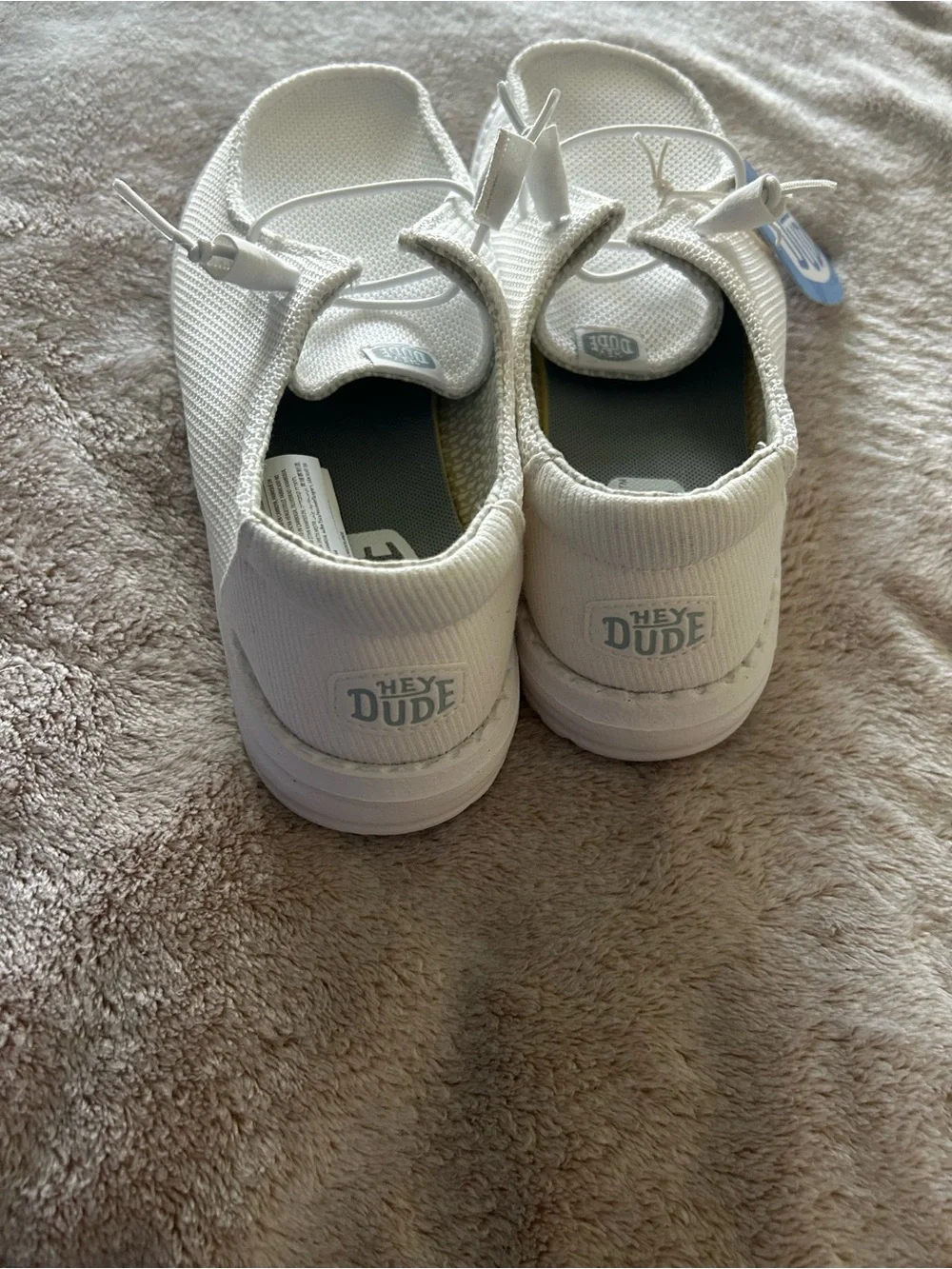 Hey Dude ladies White Slip-On Knit Sneakers. New with tags. W9